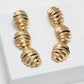 Orecchini metallo oro 3 conchiglie